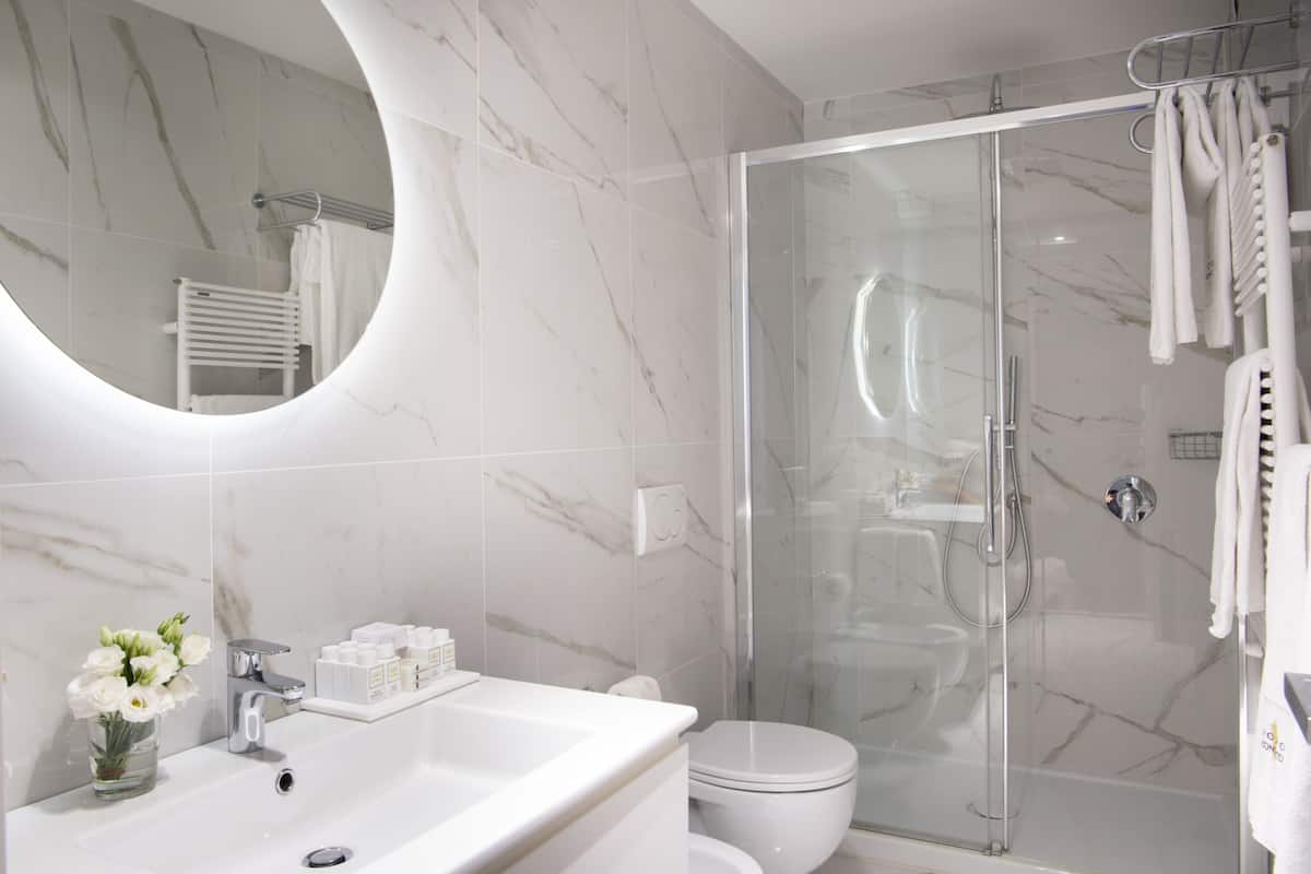 superior room | bathroom | shower, free toiletries, hair dryer, slippers