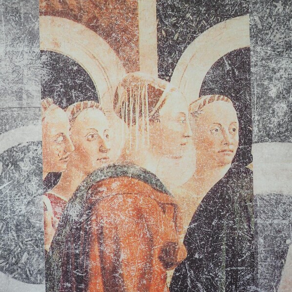 A fresco with figures in a religious scene, featuring a central figure with a halo and others in the background. - Hotel Horto Convento (Florence)