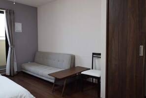 Habitación triple superior, varias camas, no fumadores | Armario