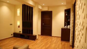 Presidential Suite, 1 Bedroom, Balcony, City View | Living room | Flat-screen TV