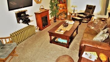 Comfort House, 2 Bedrooms, Hot Tub (The Bear Den  Ironwood, MI) | Living area | Flat-screen TV, DVD player, streaming services