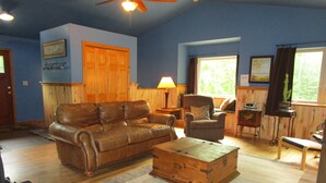 Deluxe House, 2 Bedrooms, 2 Bathrooms (Bear Cabin on Wolverine Trails) | Living area | Flat-screen TV, fireplace, DVD player - The Bear Cabin (Ironwood)