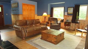 Deluxe House, 2 Bedrooms, 2 Bathrooms (Bear Cabin on Wolverine Trails) | Living area | Flat-screen TV, fireplace, DVD player