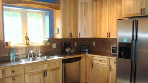 Deluxe House, 2 Bedrooms, 2 Bathrooms (Bear Cabin on Wolverine Trails) | Private kitchen | Coffee/tea maker, full-size fridge, microwave, oven - The Bear Cabin (Ironwood)
