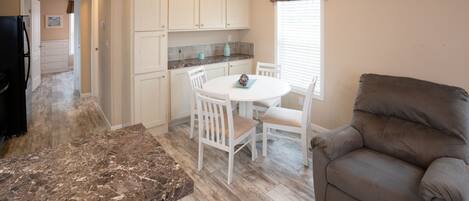 Basic Cottage, 1 Bedroom | Living room | Flat-screen TV