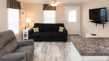 Basic Cottage, 1 Bedroom | Living room | Flat-screen TV