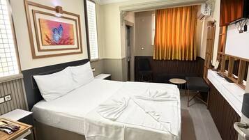 Standard Double Room | Minibar, in-room safe, desk, laptop workspace