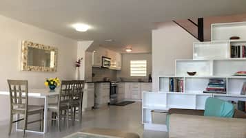 Premium Townhome, 2 Bedrooms, Kitchen, Harbor View | Living area | Flat-screen TV