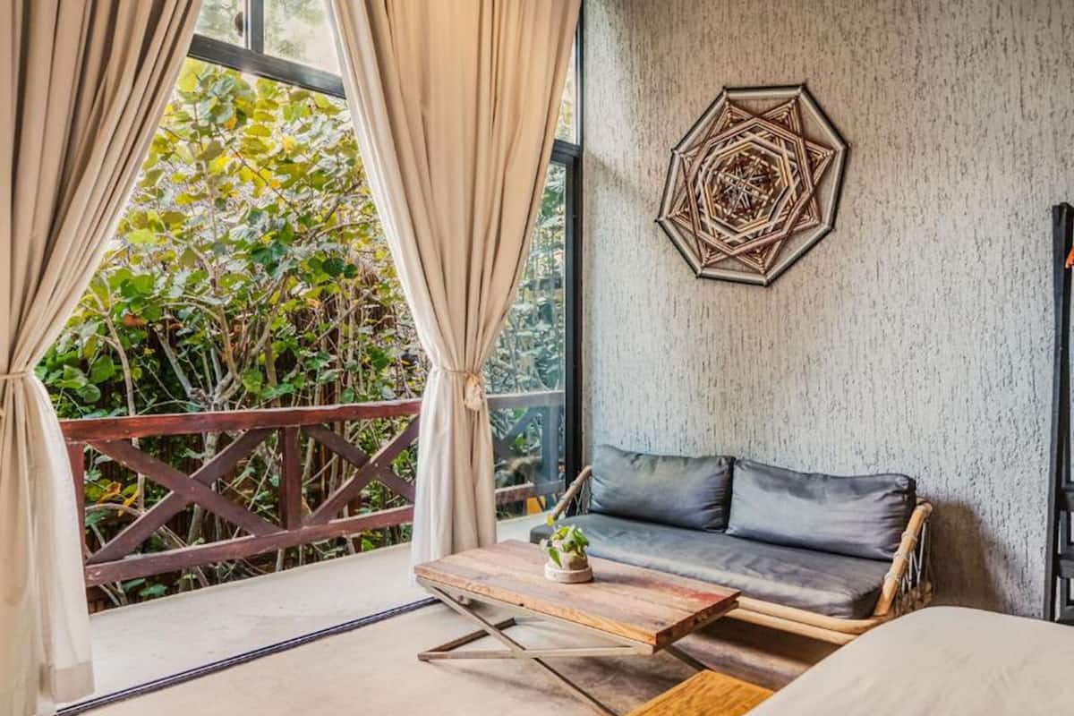 garden view villa | living area | ipod dock, books, mp3 dock