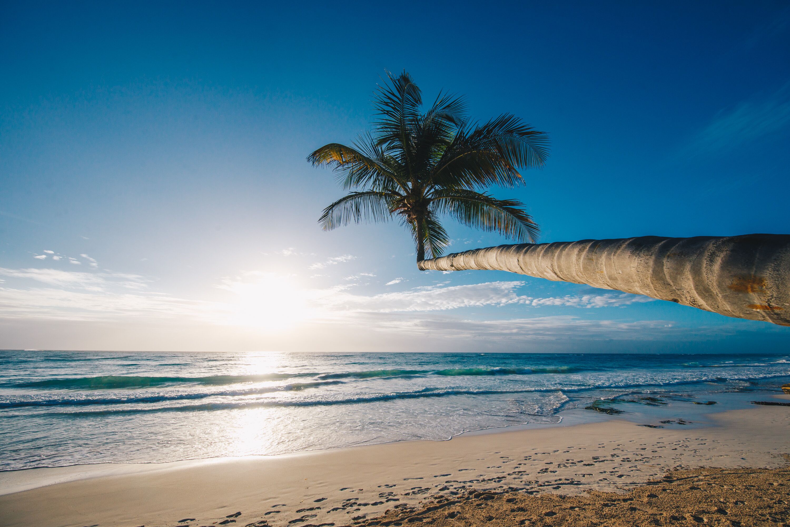 On the beach, white sand, free beach cabanas, sun loungers
