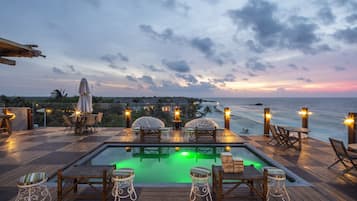 2 outdoor pools, open 2:00 PM to 10:00 PM, free pool cabanas