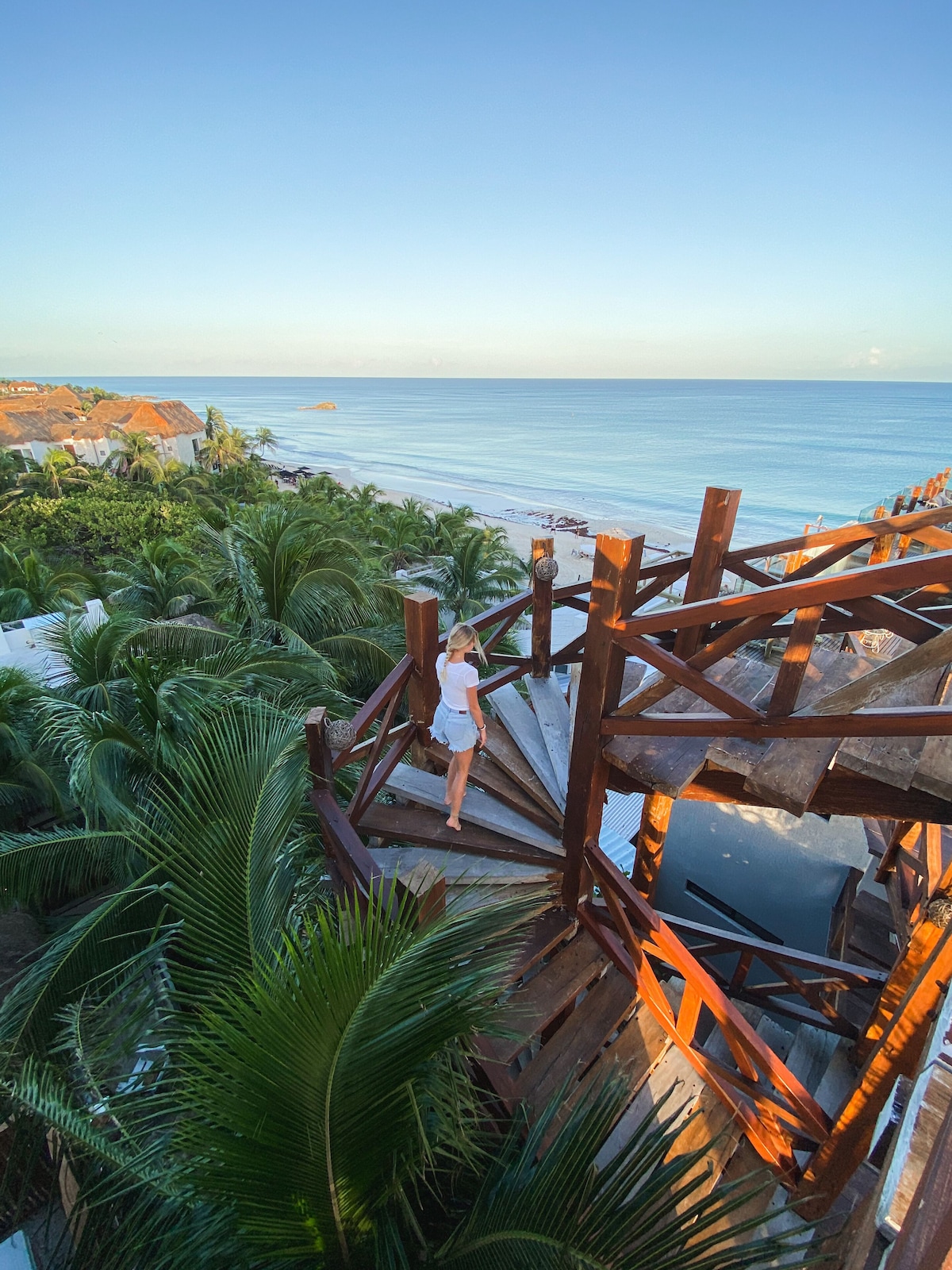 Hotelito Azul suite with spacious bedroom and lounging area on the patio