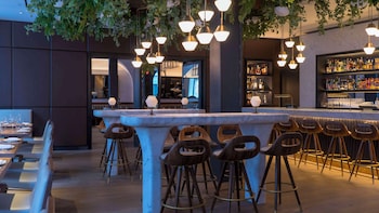 Breakfast and dinner served, Italian cuisine at Hotel Seville Nomad, in the Unbound Collection by Hyatt