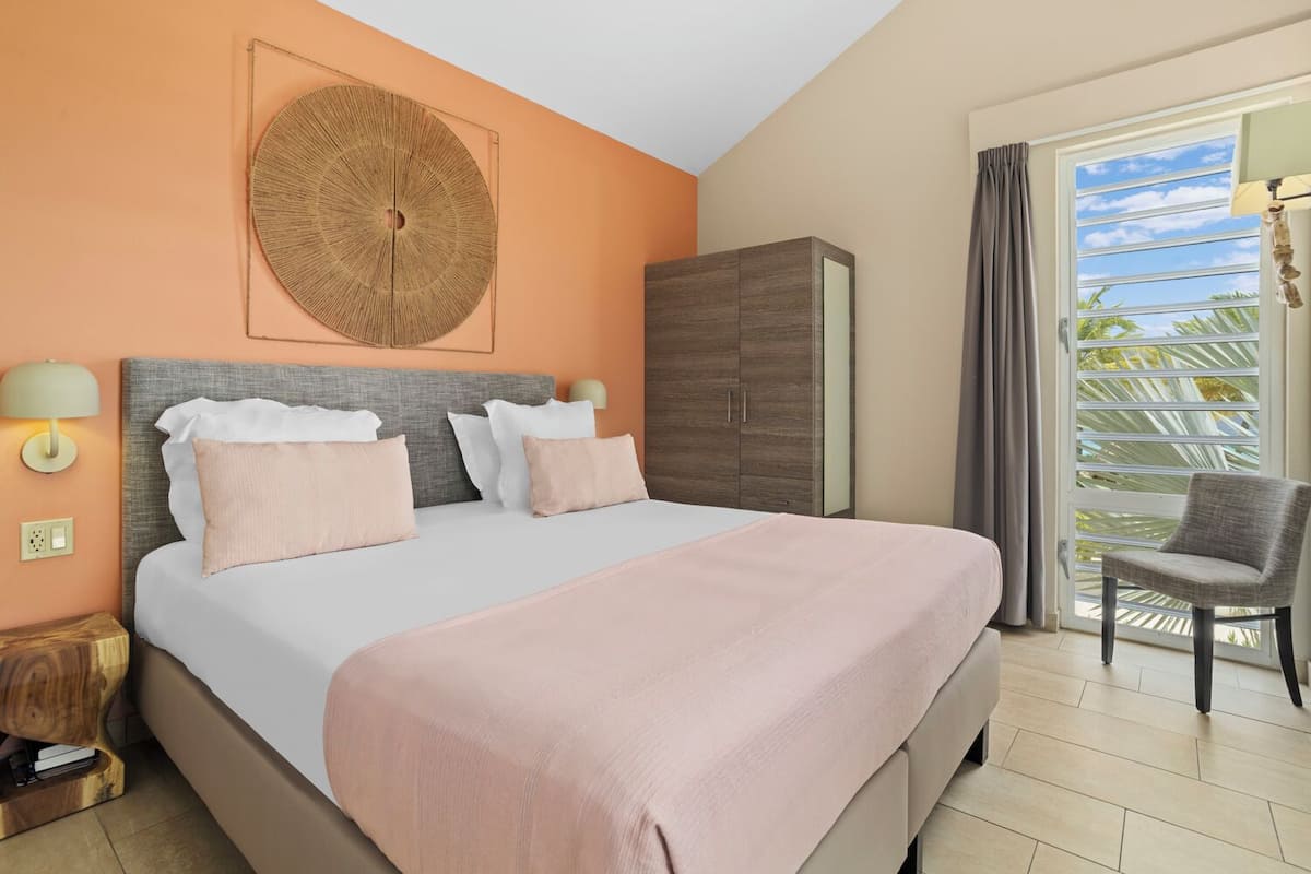 1 King Bed One Bedroom Apartment - Ocean View | In-room safe, blackout drapes, iron/ironing board (on request)