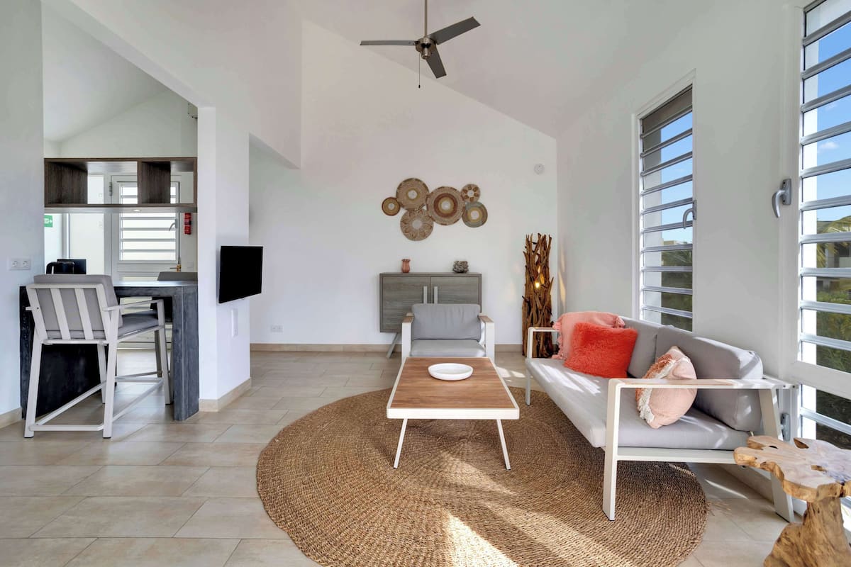 1 King Bed One Bedroom Apartment | Living area | LED TV