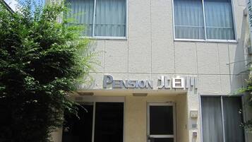 Welcome to Pension Japan, a charming residence with a simple, modern design and lush surroundings.