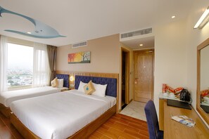 Family Room | Minibar, in-room safe, desk, free WiFi - King's Finger Luxury hotel (Da Nang)