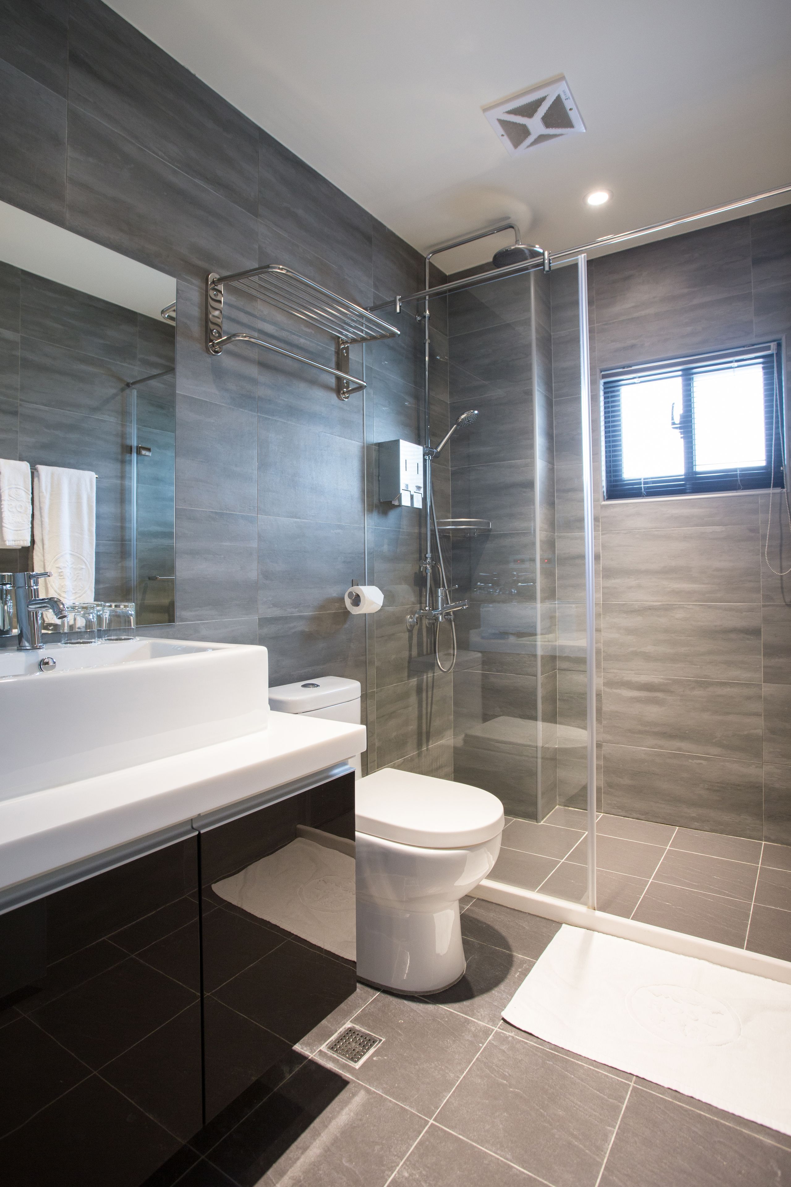 standard double room, 1 king bed | bathroom | hair dryer, slippers, towels