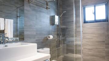 Standard Double Room, 1 King Bed | Bathroom | Hair dryer, slippers, towels