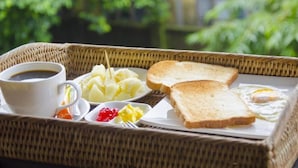 A breakfast tray with toast, scrambled eggs, potatoes, and a cup of coffee. - Shannkalay Hostel (Yangon)