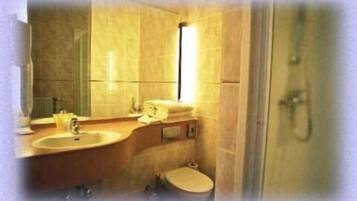 Shower, free toiletries, hair dryer, towels