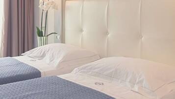Frette Italian sheets, premium bedding, pillow-top beds, minibar