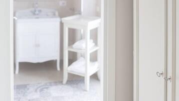 Apartment | Bathroom | Shower, rainfall showerhead, designer toiletries, hair dryer