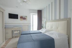 Italiaanse Frette-lakens, luxe beddengoed, pillowtop-bedden, een minibar