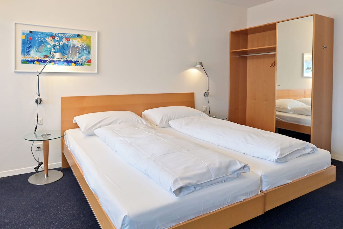 Habitación doble Confort, 1 cama matrimonial | Ropa de cama de alta calidad y minibar