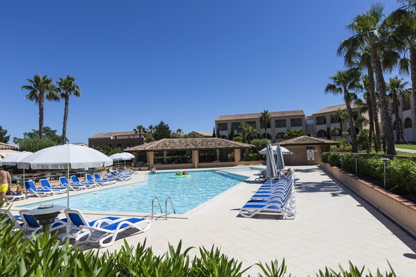 2 outdoor pools, pool umbrellas, pool loungers