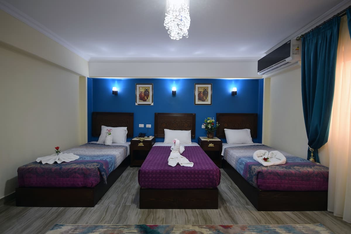 Standard Triple Room, City View | Egyptian cotton sheets, premium bedding, pillowtop beds, minibar