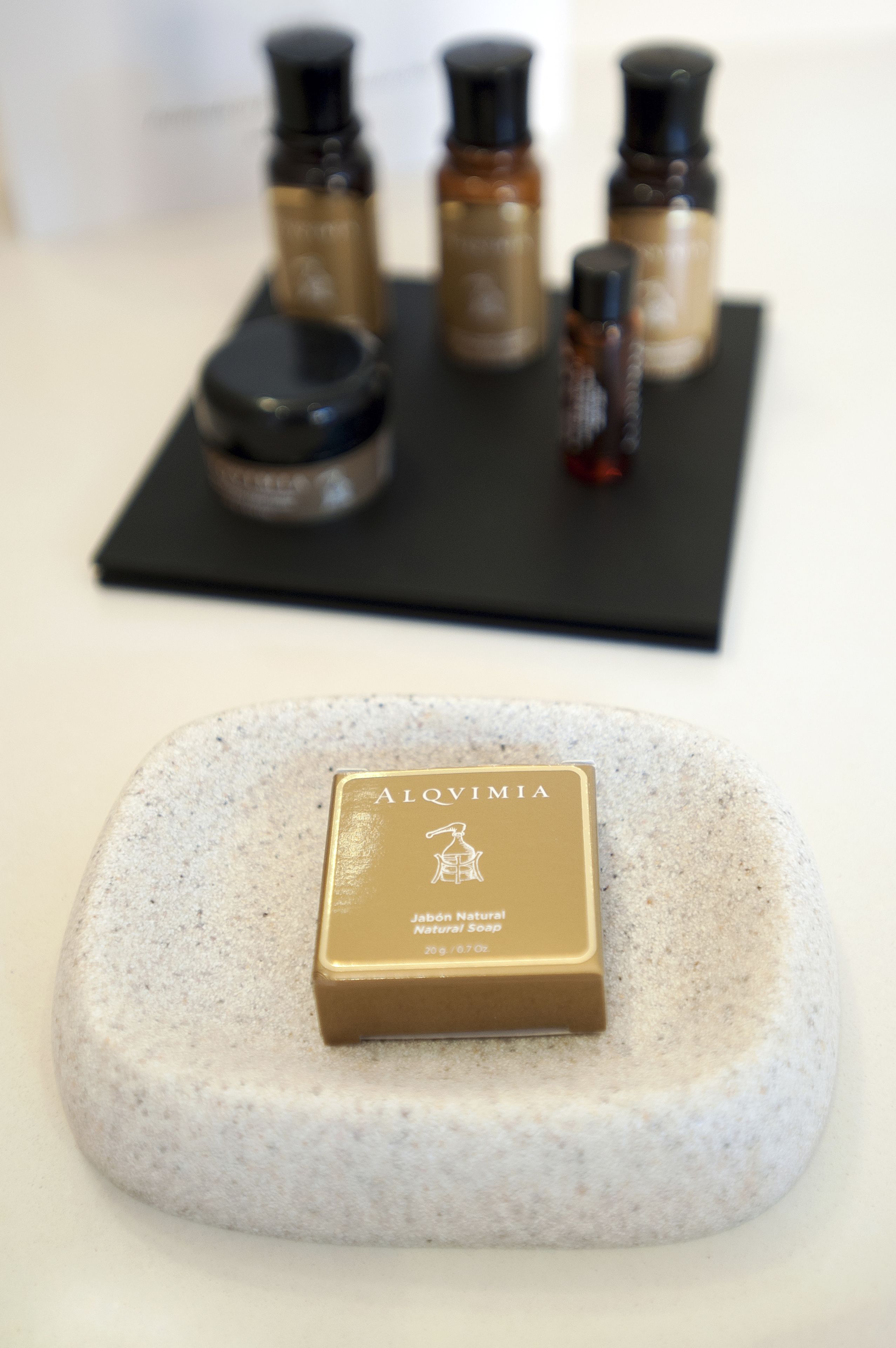 designer toiletries, hair dryer, bathrobes, slippers