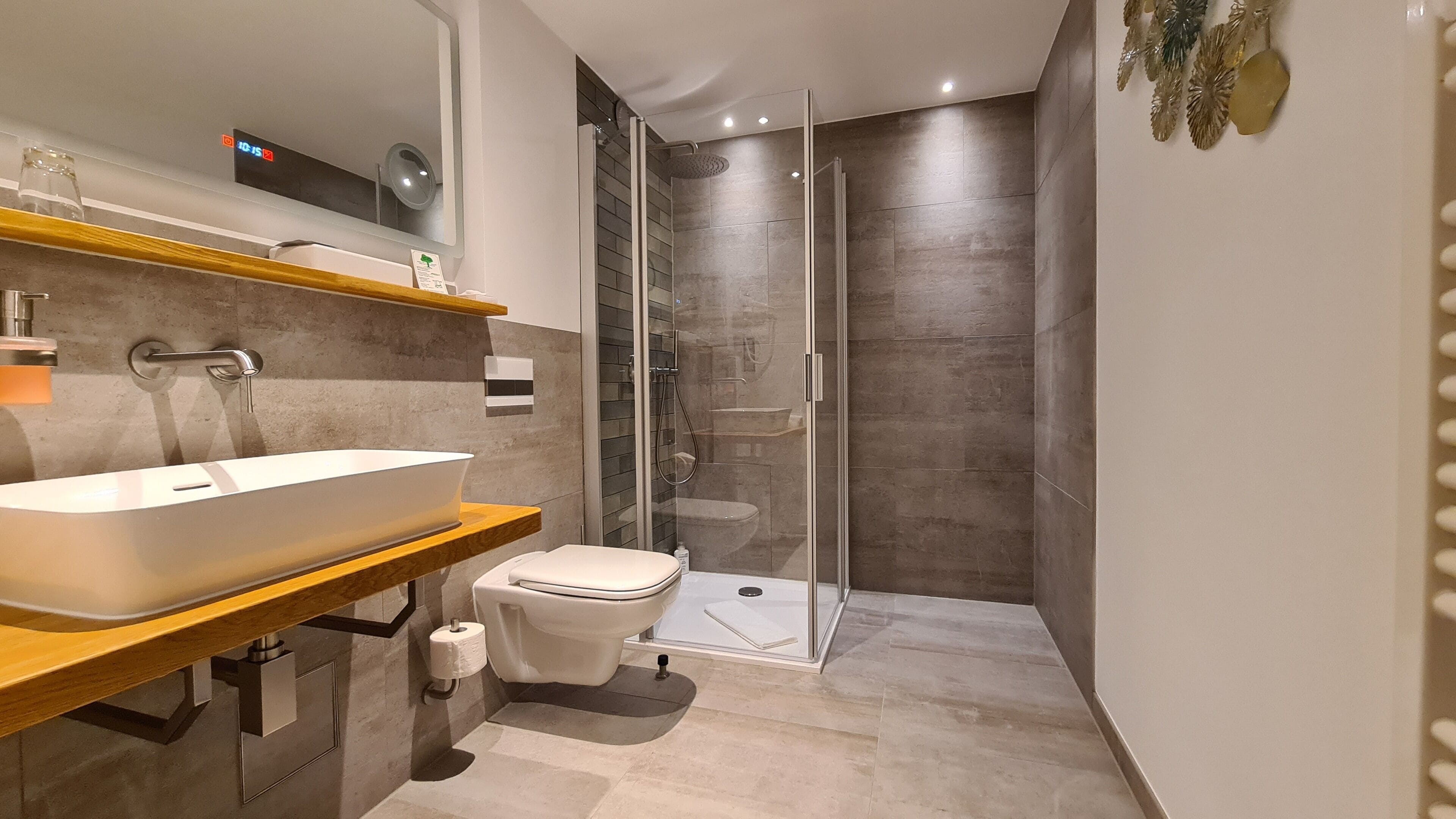 junior studio suite | bathroom | shower, free toiletries, hair dryer, towels