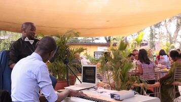 Breakfast, lunch, dinner served; Mediterranean cuisine, garden views