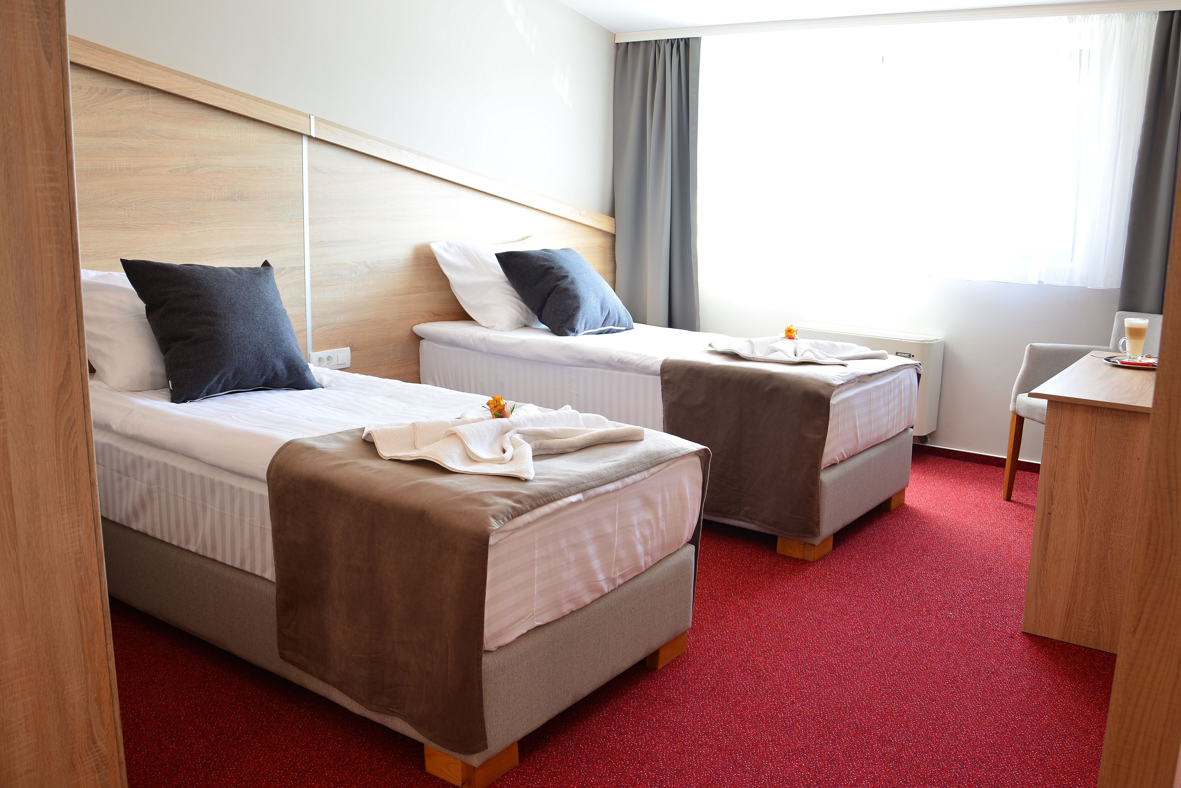 classic twin room | in-room safe, desk, laptop workspace, soundproofing