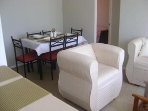 Standard Apartment, 3 Bedrooms, Terrace | Living area | Flat-screen TV