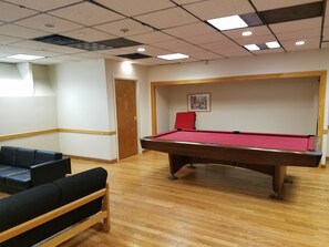 Game room - Packard's Corner Apartments by Atlas (Boston)