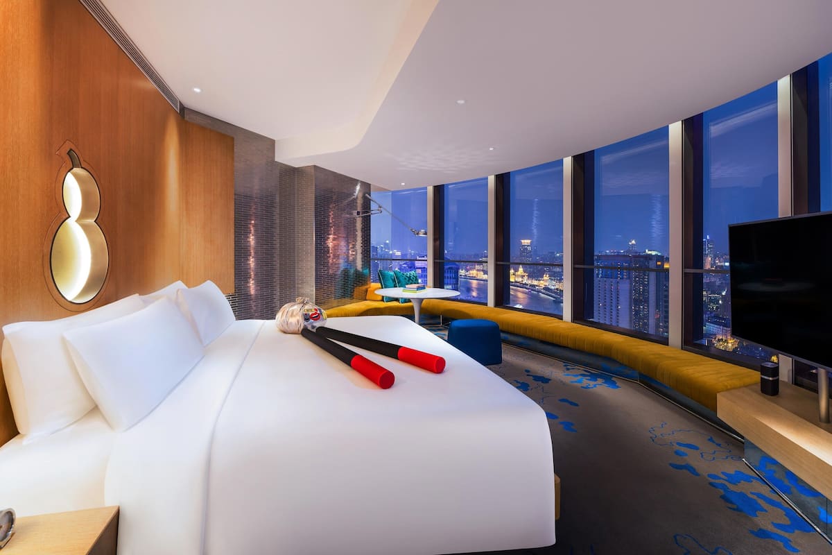 Chambre, 1 très grand lit | Literie de qualité, minibar, coffre-fort, rideaux d’obscurcissement