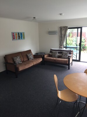 Two Bedroom Townhouse | Living area | Flat-screen TV - Our Beach House - Raglan West (Raglan)