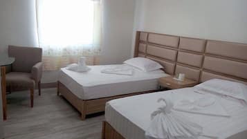 Twin Deluxe Room | Desk, bed sheets