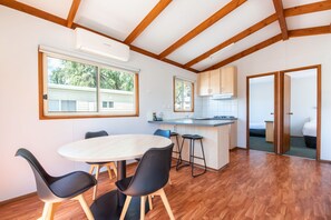 Family Cabin - Sleeps 4 | Living area | 50-inch flat-screen TV with digital channels - Echo Holiday Parks - Naracoorte (Naracoorte)