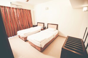 Premium bedding, pillow-top beds, desk, blackout curtains