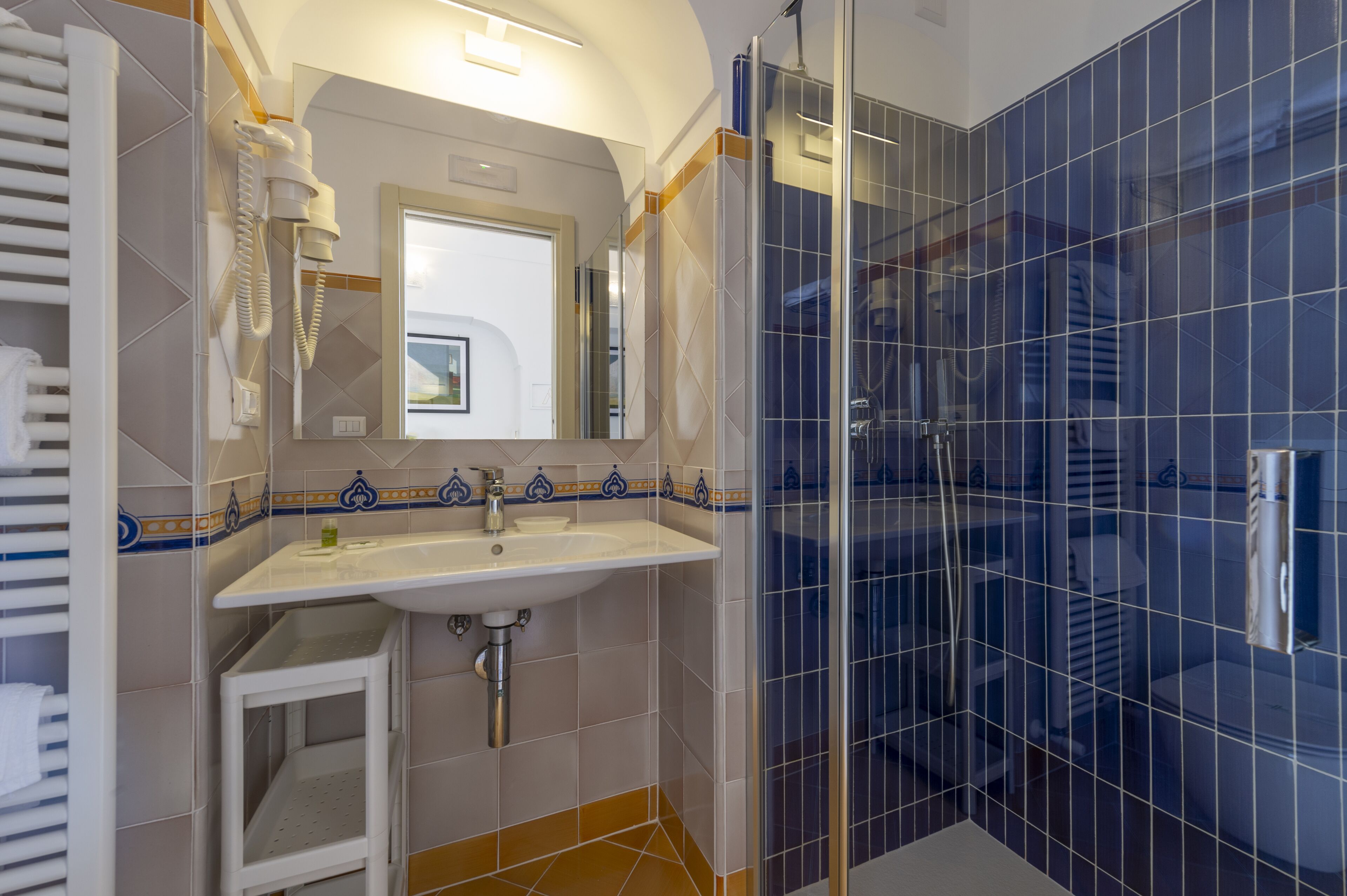 superior double room, 1 queen bed, balcony, sea view | bathroom | hair dryer, towels, soap, shampoo