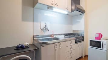 1 Bed Room, Dining Room and Kitchen (Up to 3 Guests) | Private kitchen | Fridge, microwave, stovetop, electric kettle