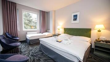 Junior Triple Room, 2 Bedrooms, Accessible, Park View | Blackout drapes, soundproofing, free WiFi, bed sheets