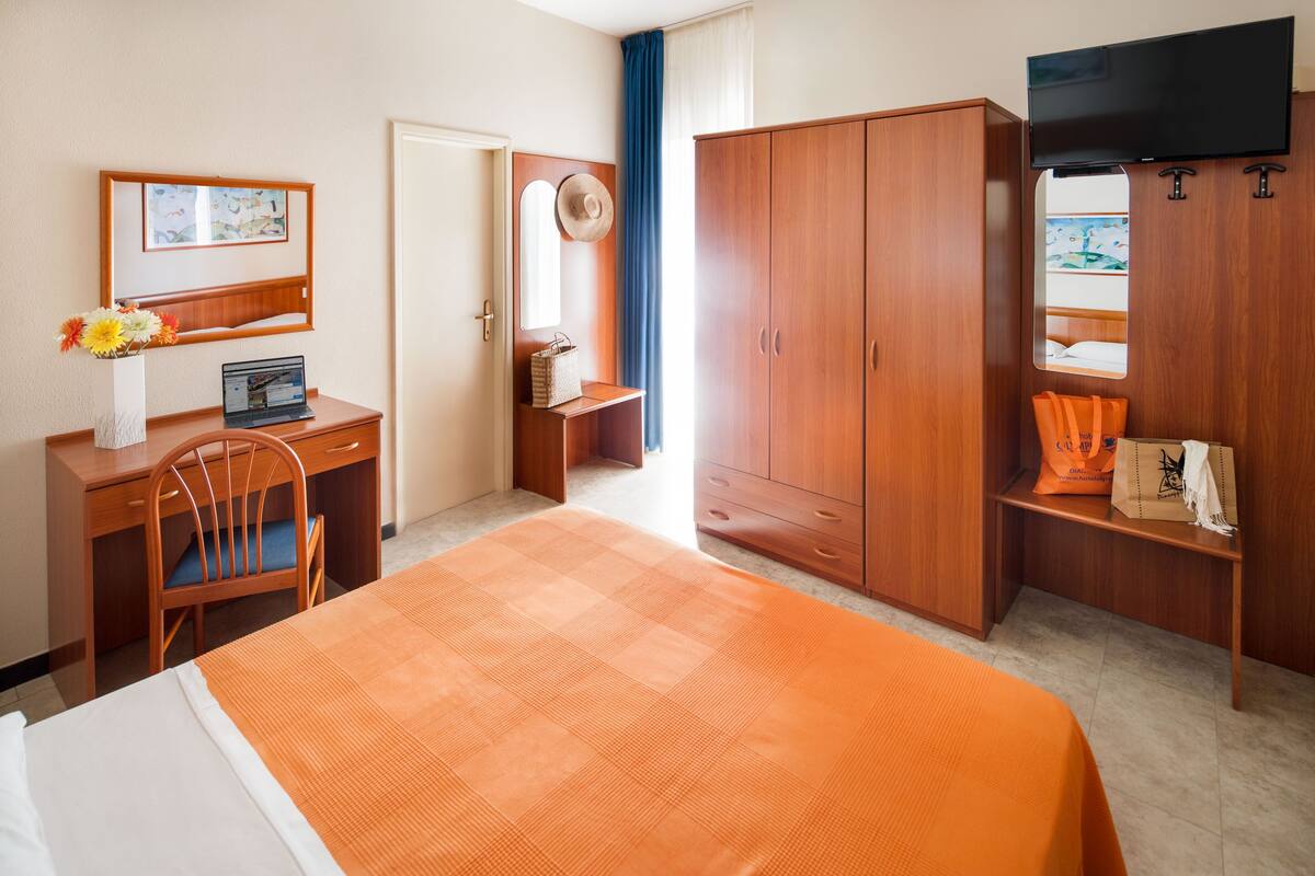 Standard Triple Room, Balcony | In-room safe, individually furnished, desk, free WiFi