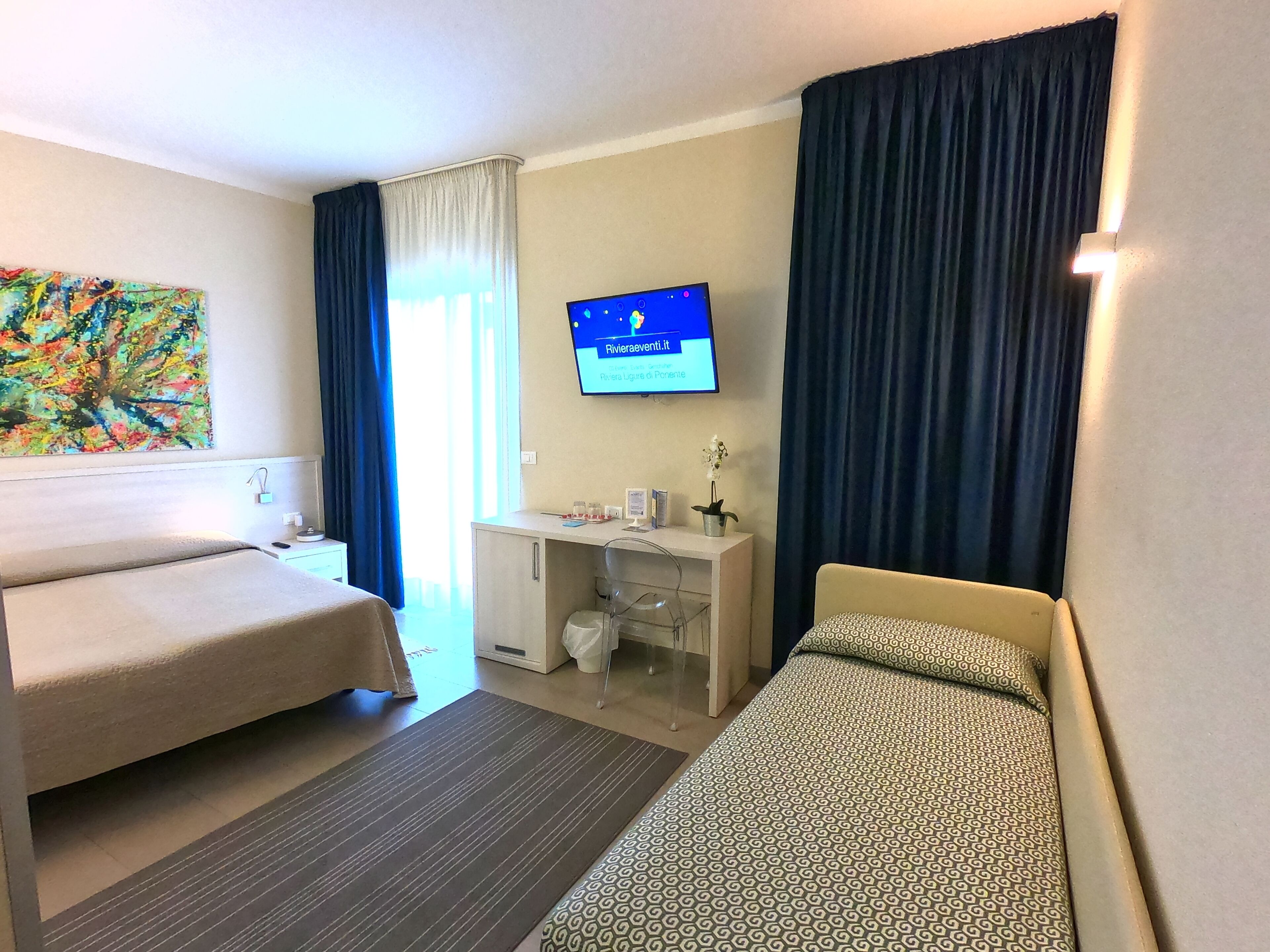 family room, balcony | in-room safe, individually furnished, desk, free wifi