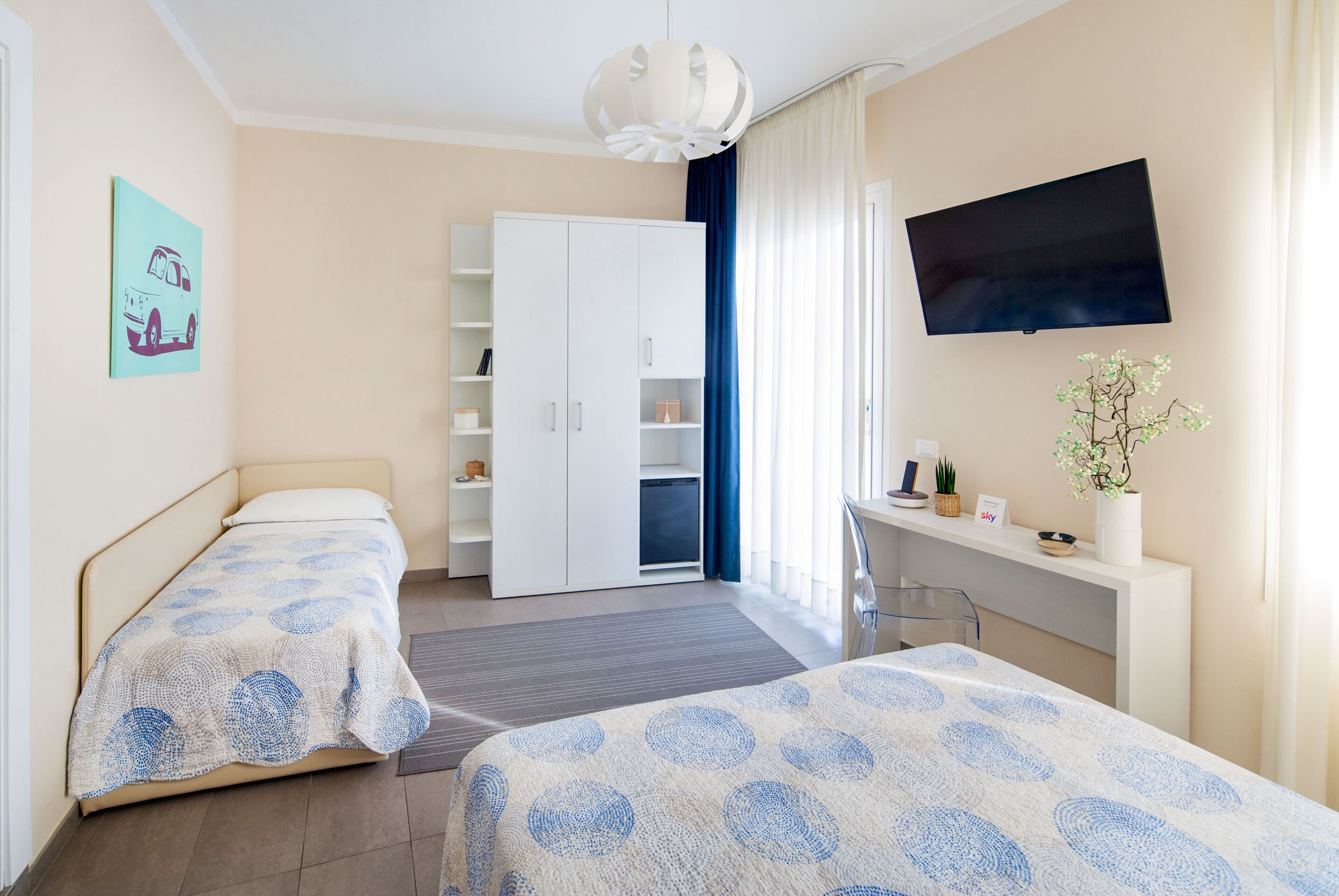 family room, balcony | in-room safe, individually furnished, desk, free wifi