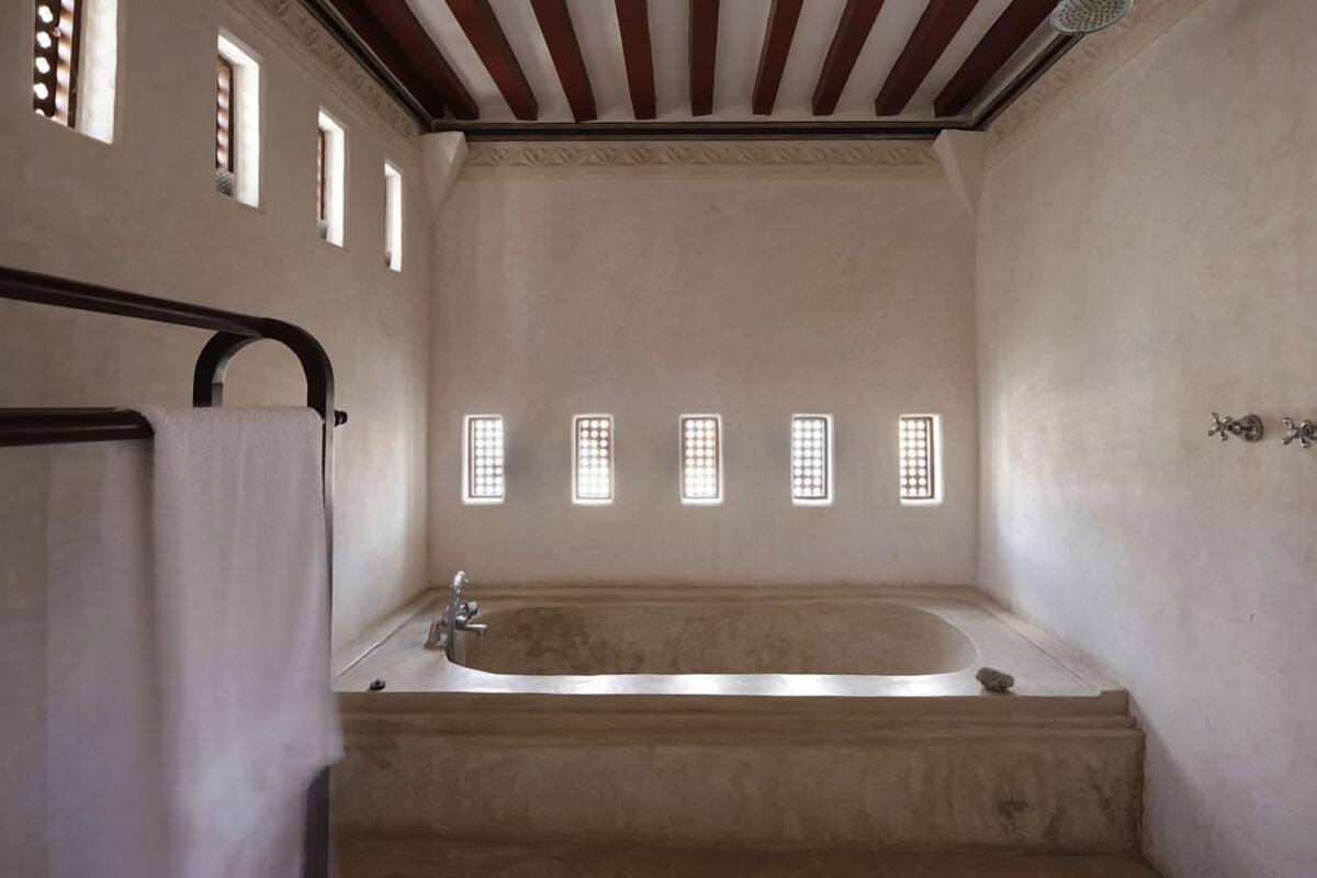 junior suite, ocean view | bathroom | shower, free toiletries, hair dryer, towels