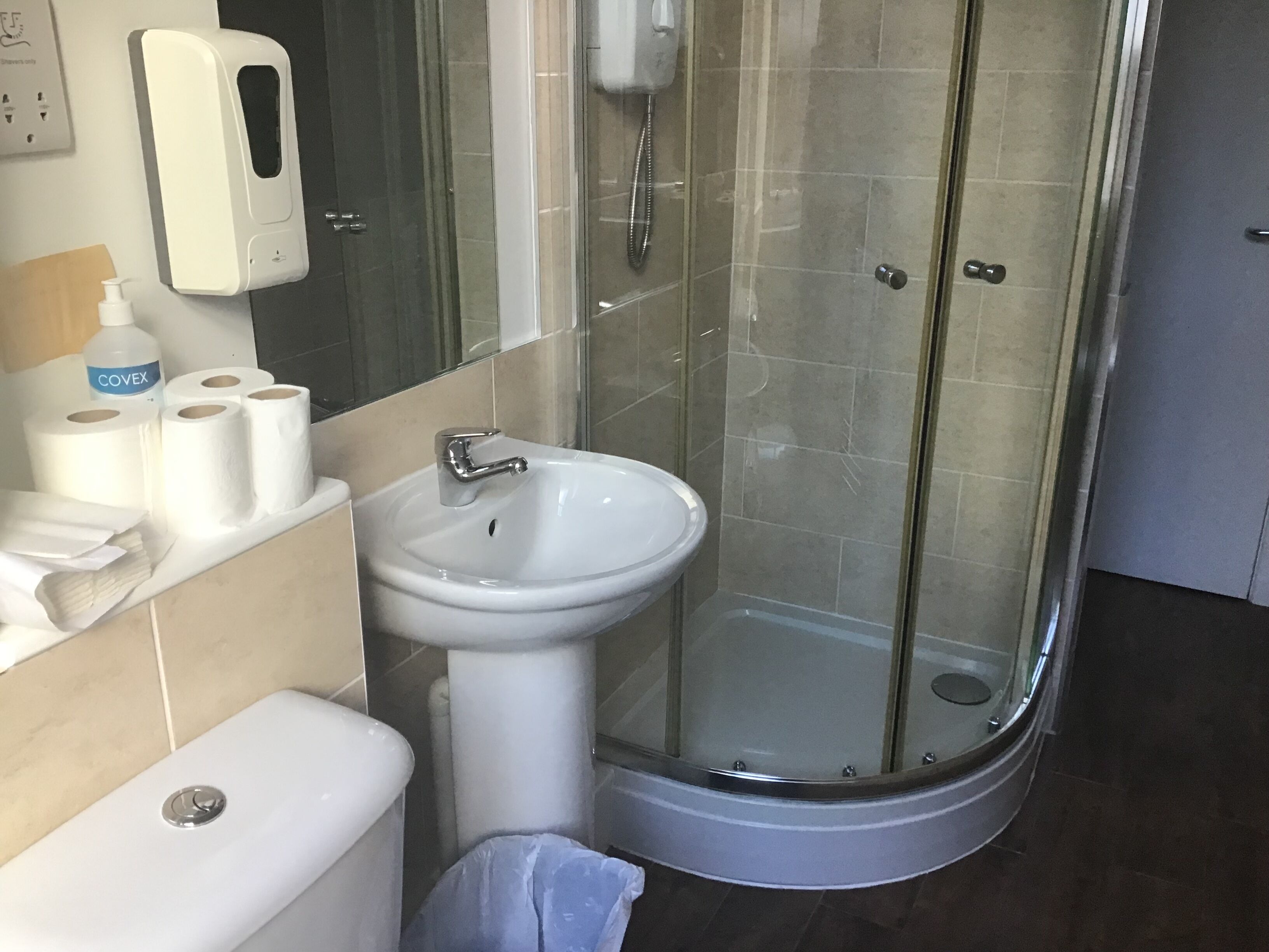 shower, free toiletries, hair dryer, towels